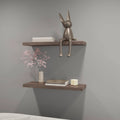 Cognac finish floating wall shelf from Anthony & Home's Atelier Collection, wall-mounted with a sleek, limited edition design.