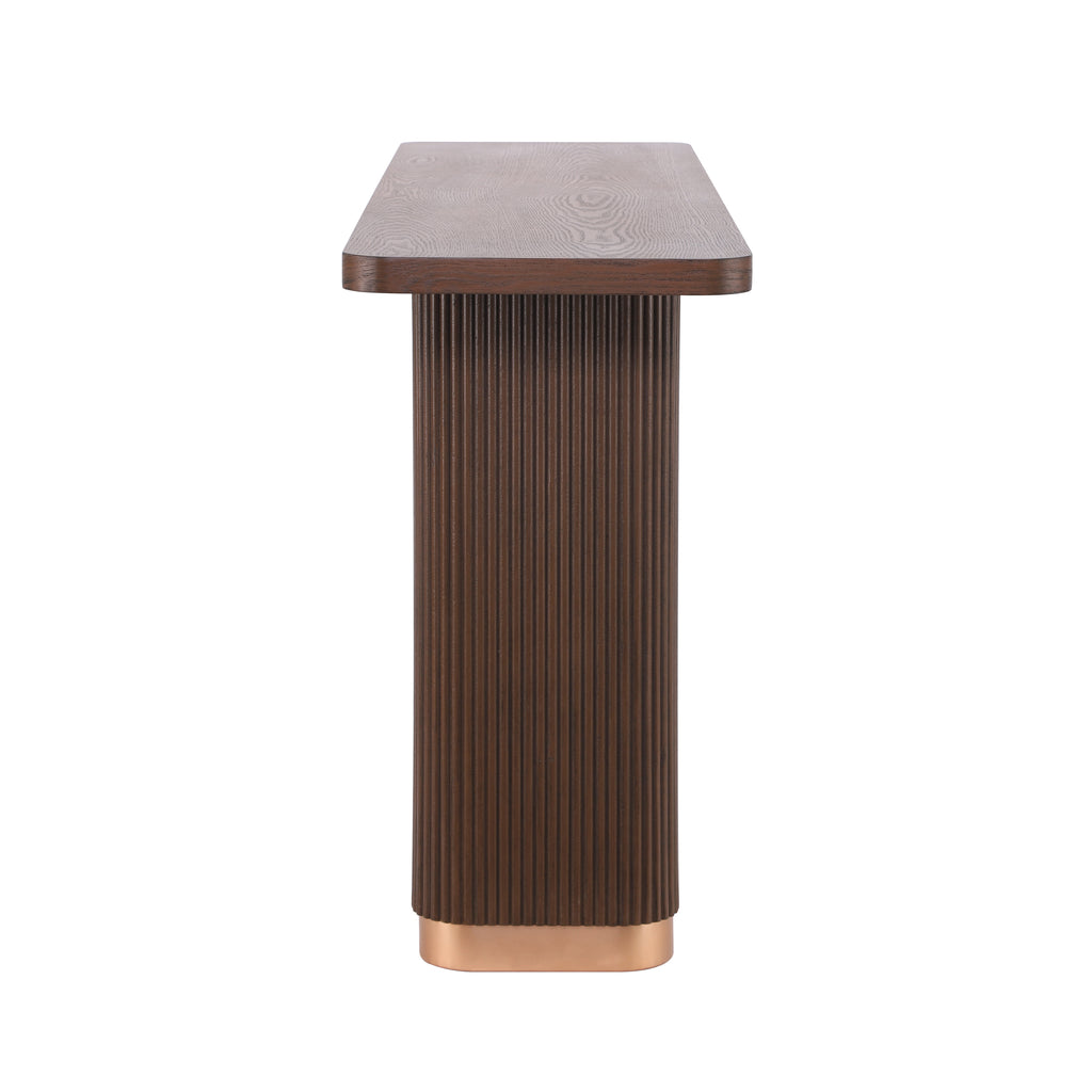Anthony & Home console table with ash veneer top, fluted base, and metal accents in a modern studio design.