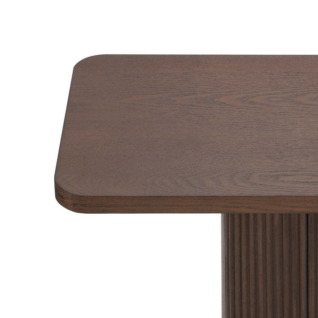 Anthony & Home console table with ash veneer top, fluted base, and metal accents from the Studio Collection.