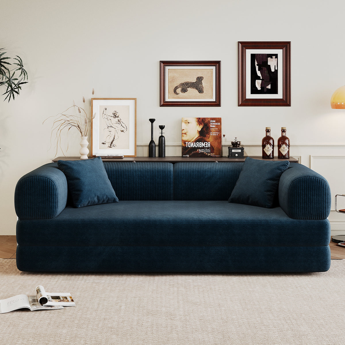 Blue corduroy convertible sofa bed by Anthony & Home, showing the sofa in both seated and unfolded bed positions.