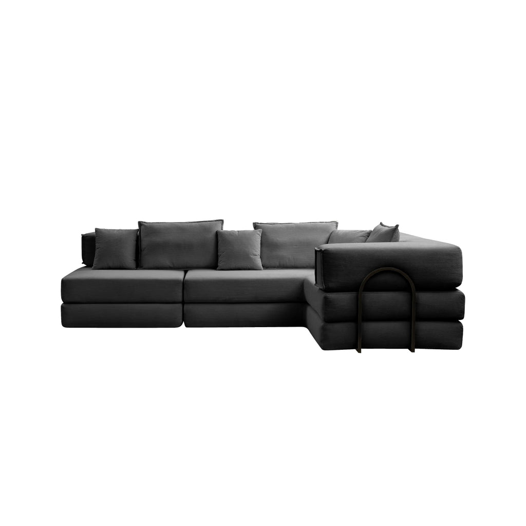 Black corduroy modular sectional sofa by Anthony & Home, showing its plush fabric and customizable sections.