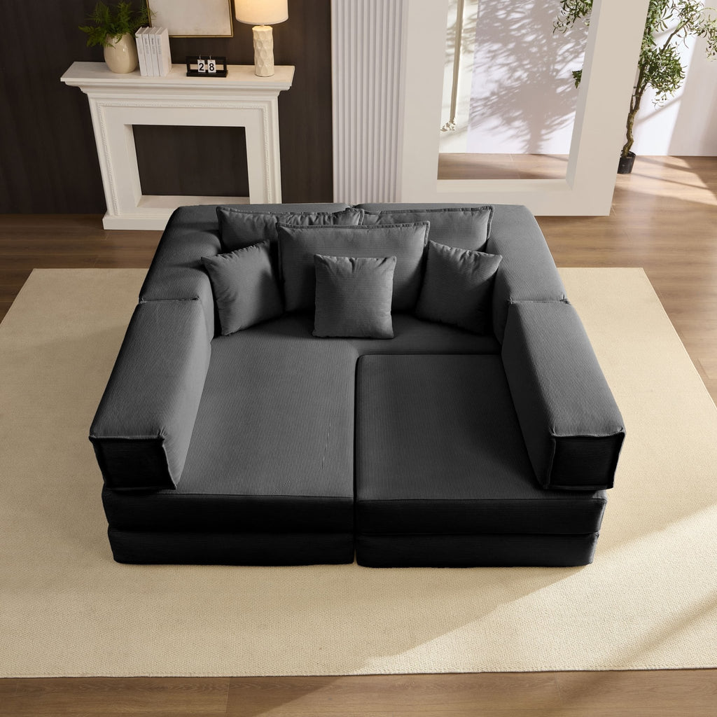 Black corduroy modular sectional sofa by Anthony & Home, showing plush cushions and modern design in a stylish living room setting.
