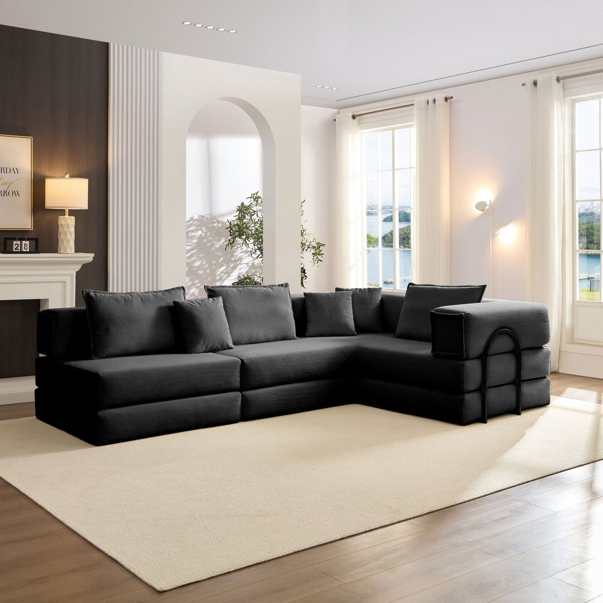 Black corduroy modular sectional sofa by Anthony & Home, showcasing a stylish and comfortable seating arrangement.