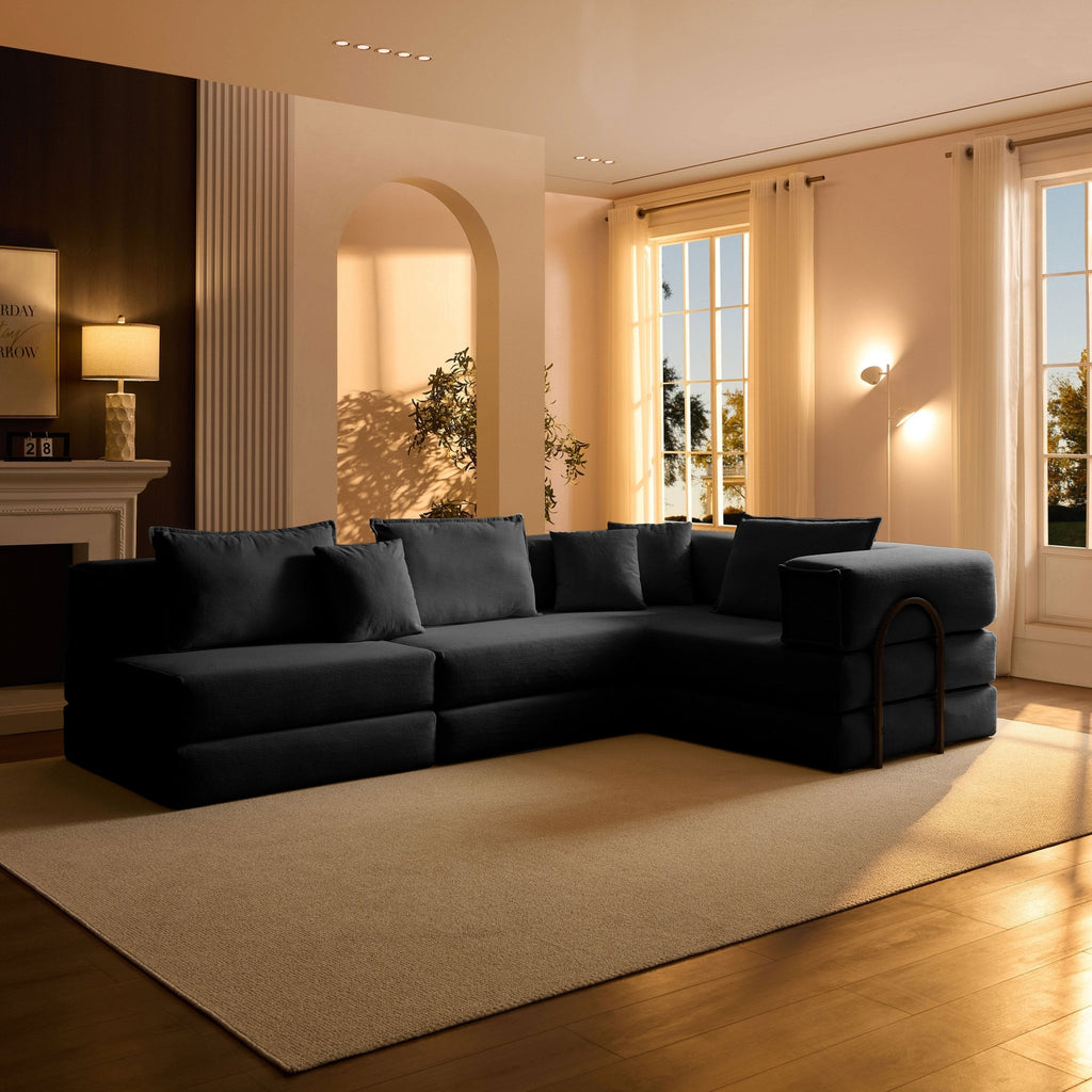 Black corduroy modular sectional sofa by Anthony & Home with plush cushions and contemporary design, perfect for modern living rooms.