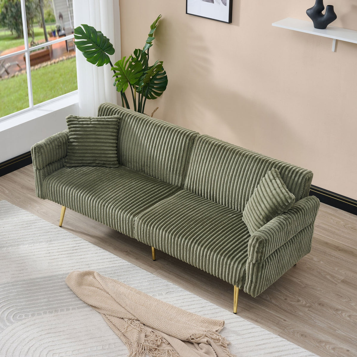 Emerald green corduroy velvet sofa bed by Anthony & Home, stylish convertible furniture with plush fabric and modern design.