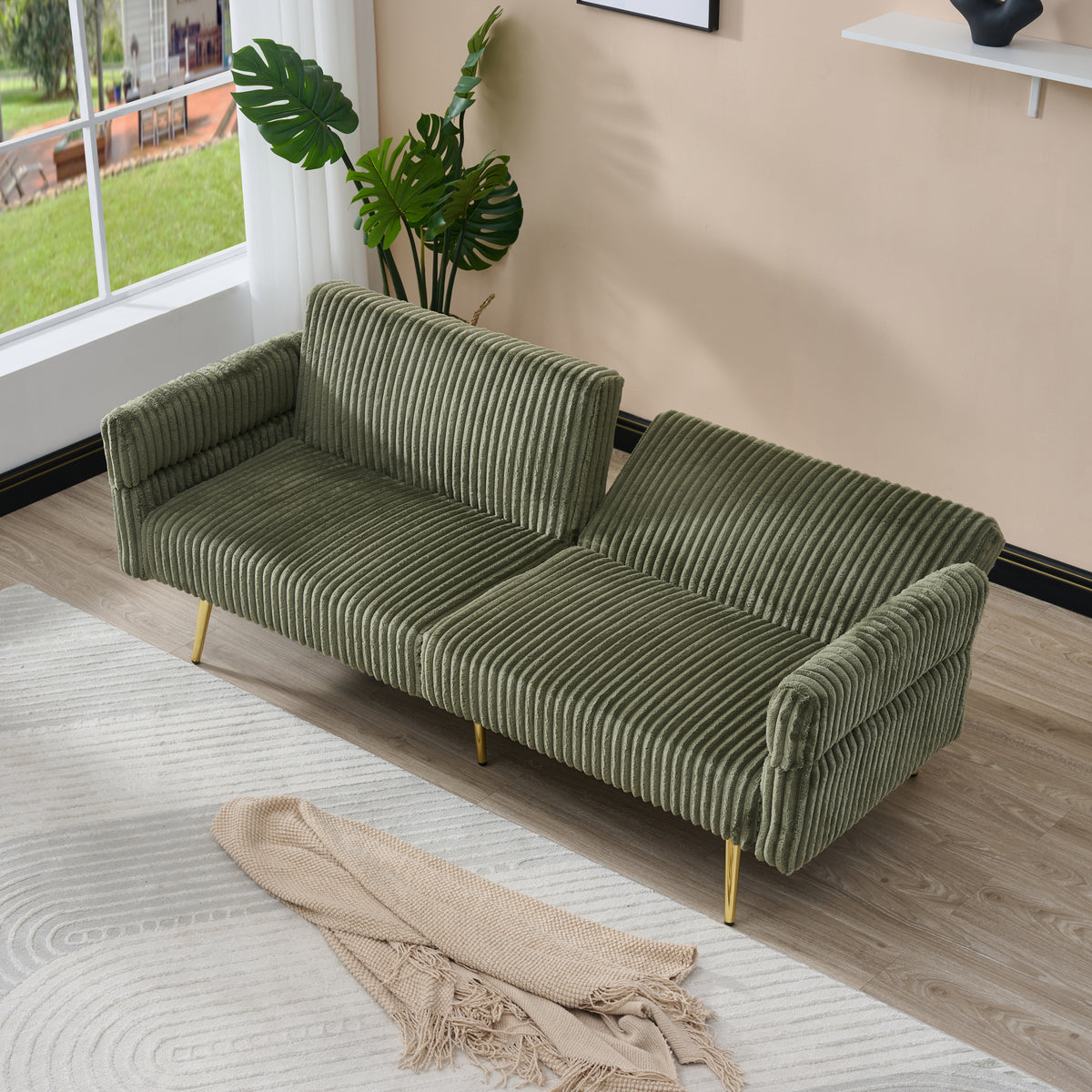 Emerald green corduroy velvet sofa bed by Anthony & Home, showcasing a stylish and plush convertible sofa with modern design.
