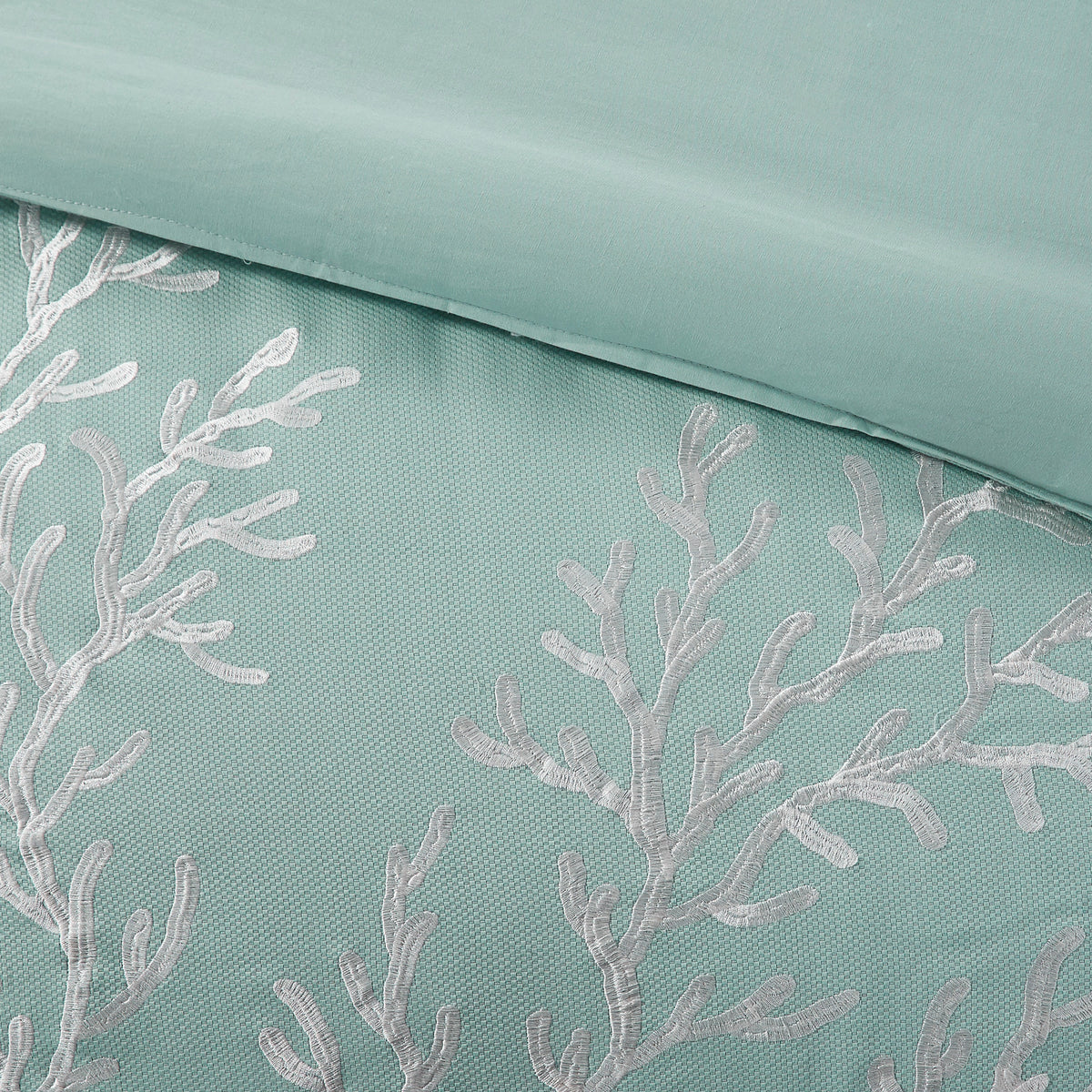 Aqua cotton jacquard comforter set in queen size with intricate pattern, designed by Anthony & Home, limited edition bedding.