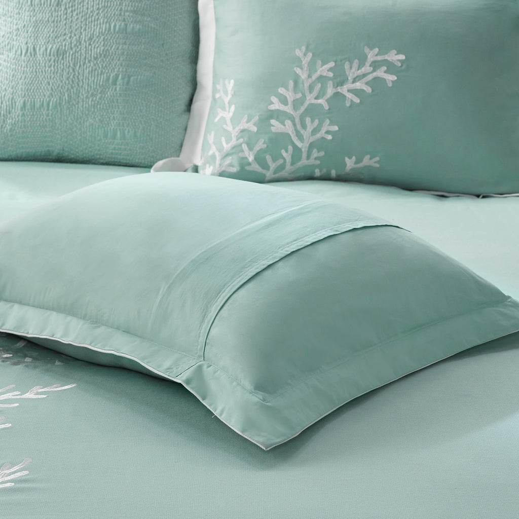 Queen-sized Anthony & Home cotton jacquard comforter set in aqua, showcasing intricate textured design and luxurious fabric.
