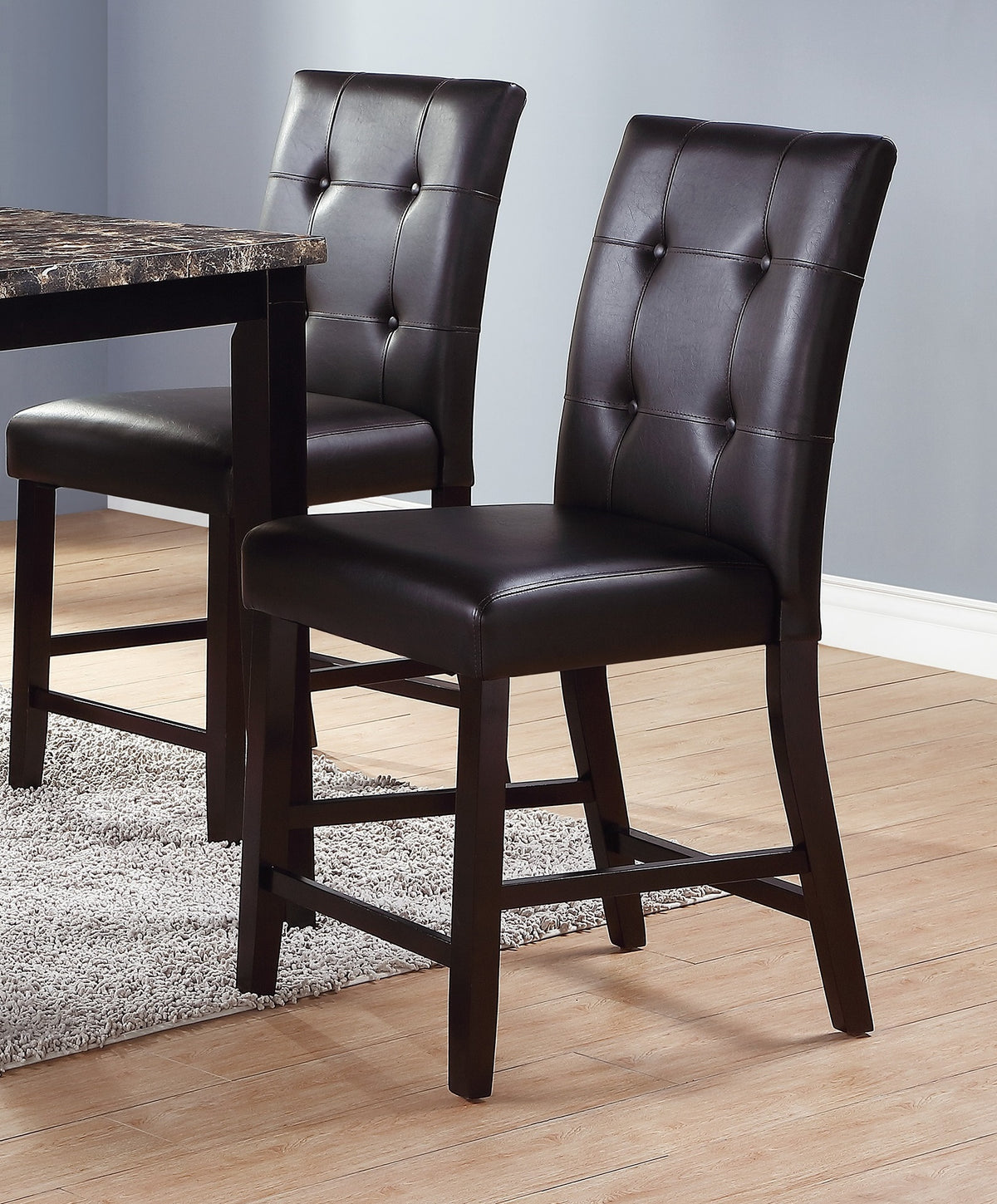 Counter height dining set with faux marble table from Anthony & Home, featuring four matching chairs in a contemporary style.