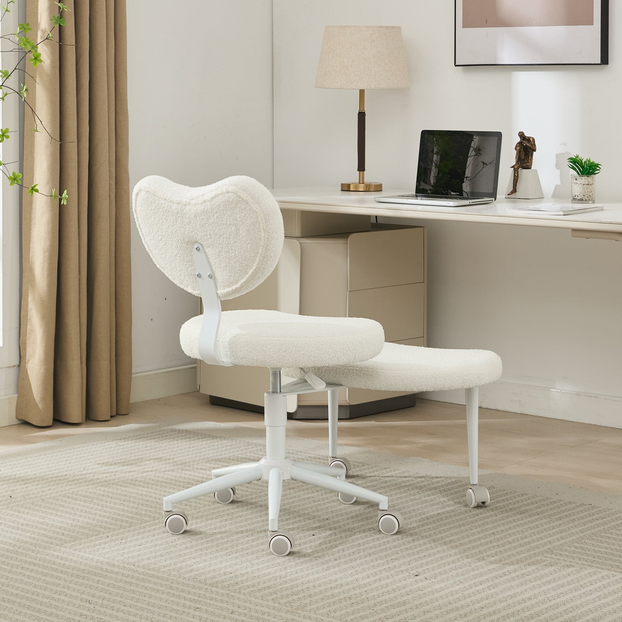 Ivory cross-legged meditation chair with wheels by Anthony & Home, featuring a comfortable padded seat and sturdy frame.
