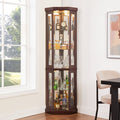 Dark cherry corner curio cabinet by Anthony & Home with glass doors and shelves for display.