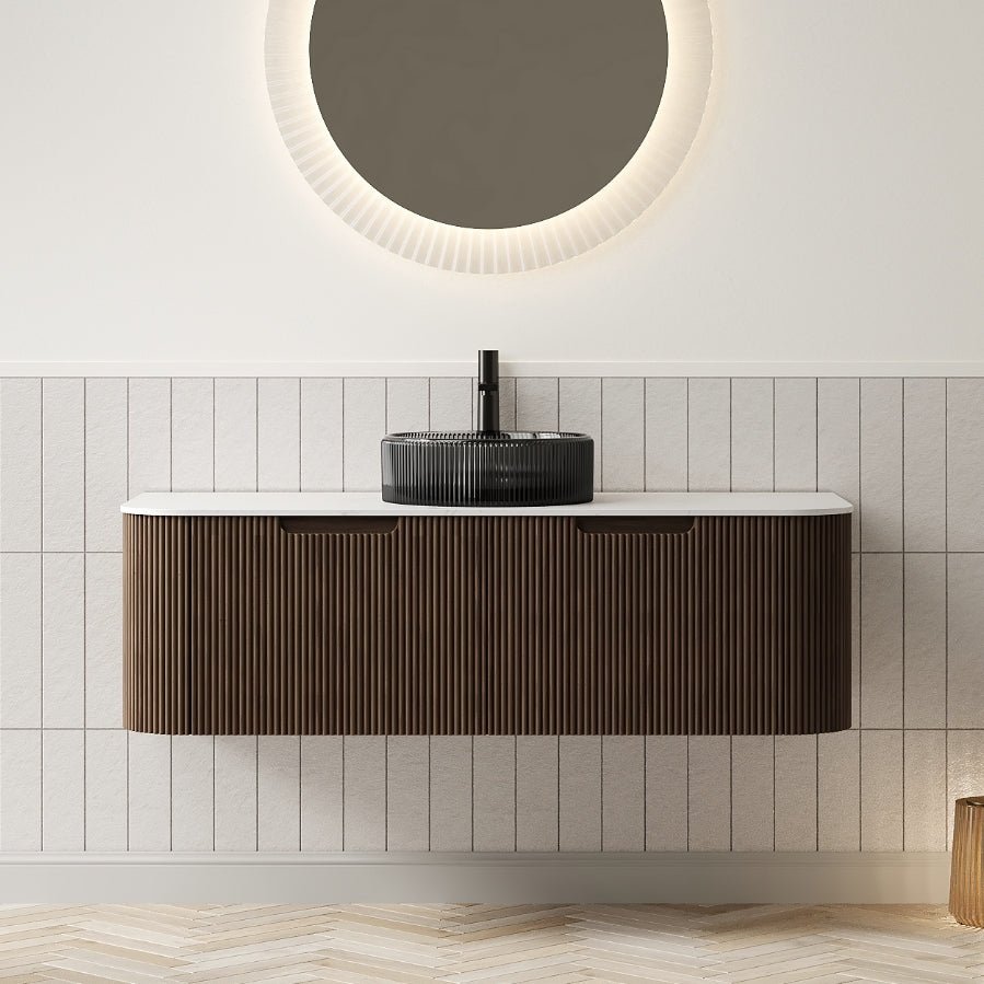Dina wall-mounted bathroom vanity in dark walnut woodgrain with sleek design and modern hardware from Anthony & Home.