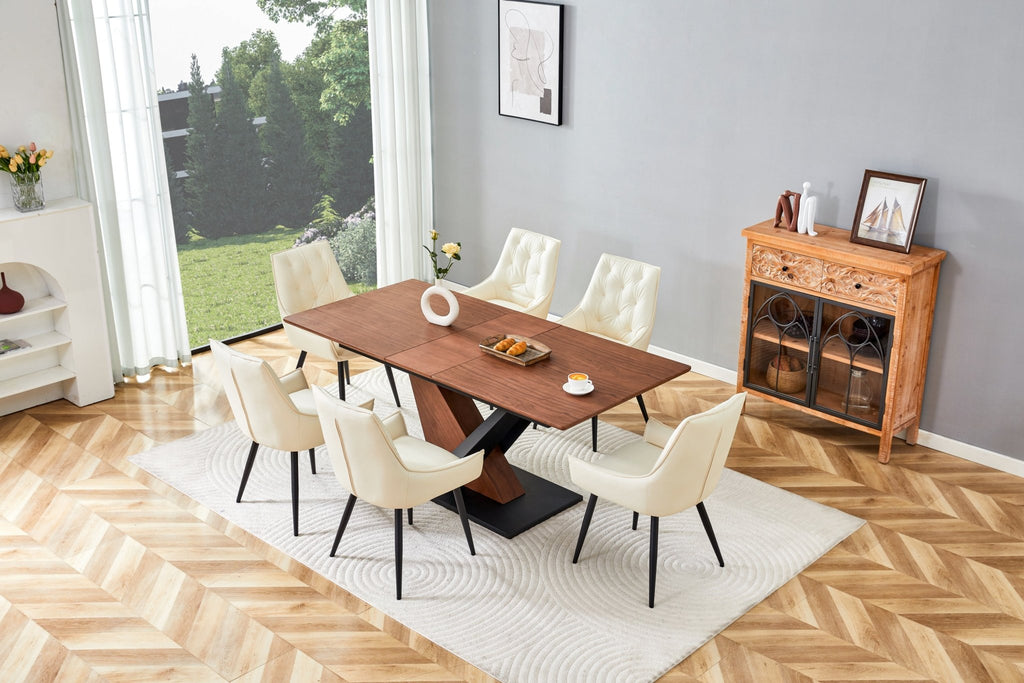 Dark walnut dining table with marble veneer top from Anthony & Home, showcasing a sleek, modern design in a stylish studio setting.
