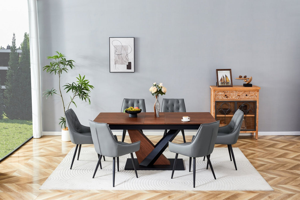 Dark walnut dining table with marble veneer top by Anthony & Home, showcasing a sleek, modern design in a stylish studio setting.