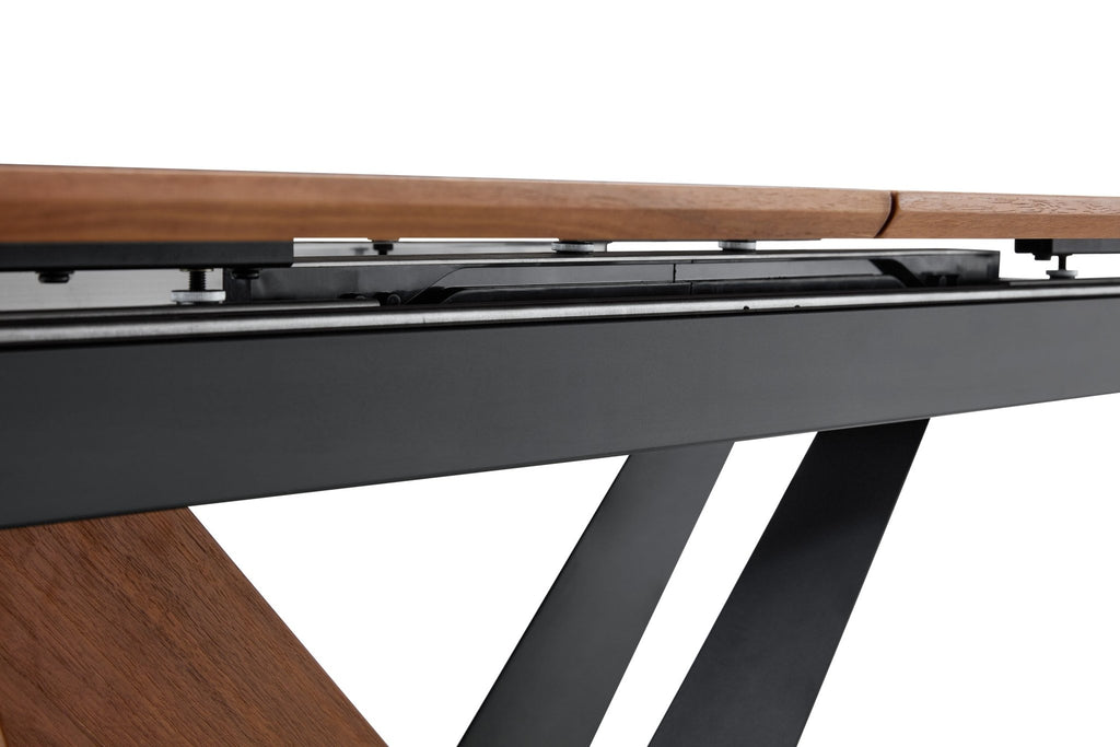 Dark walnut dining table with marble veneer top by Anthony & Home, showcasing a sleek, modern studio setting.