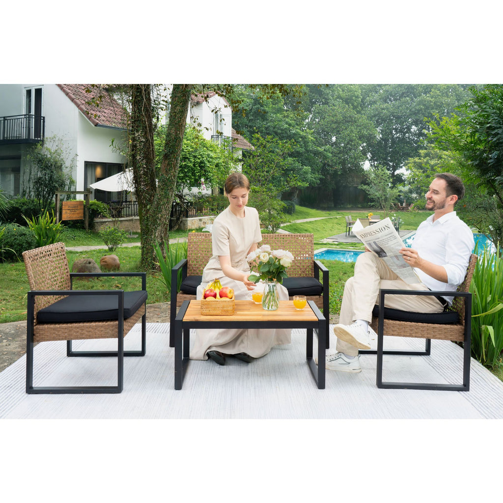 Outdoor 4-piece patio set by Anthony & Home with acacia wood table and handwoven PE rattan chairs.