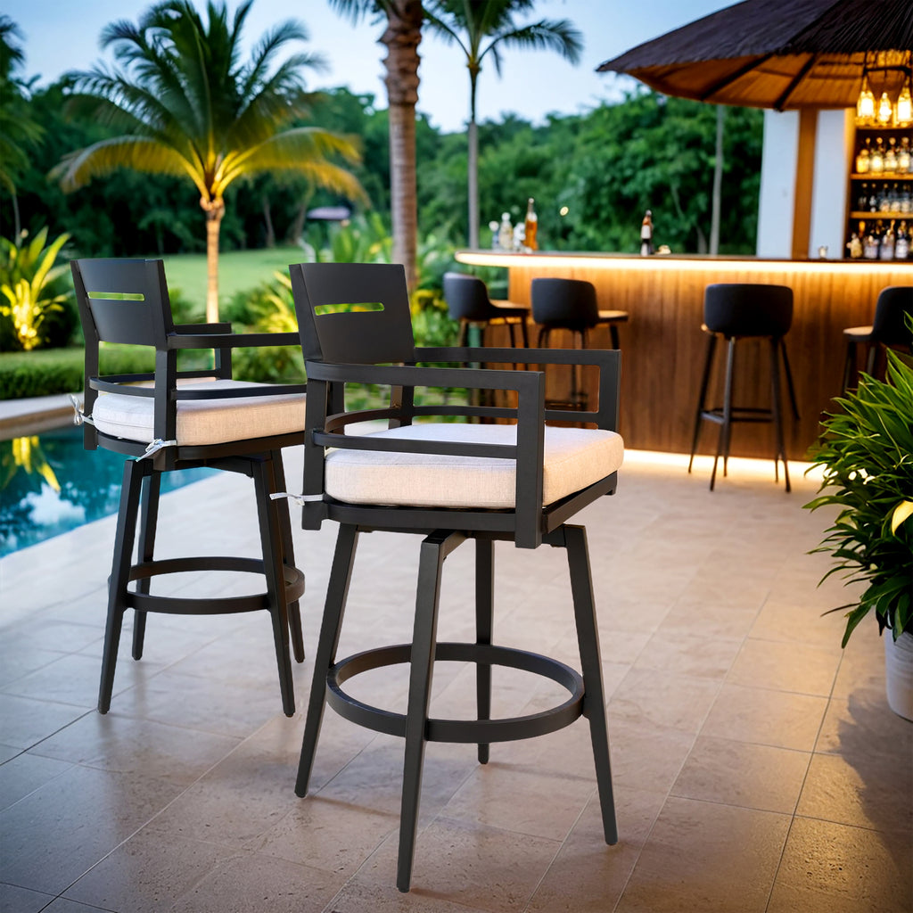 Black aluminum swivel bar chairs with Sunbrella cushions by Anthony & Home, featuring sleek design and comfortable seating.