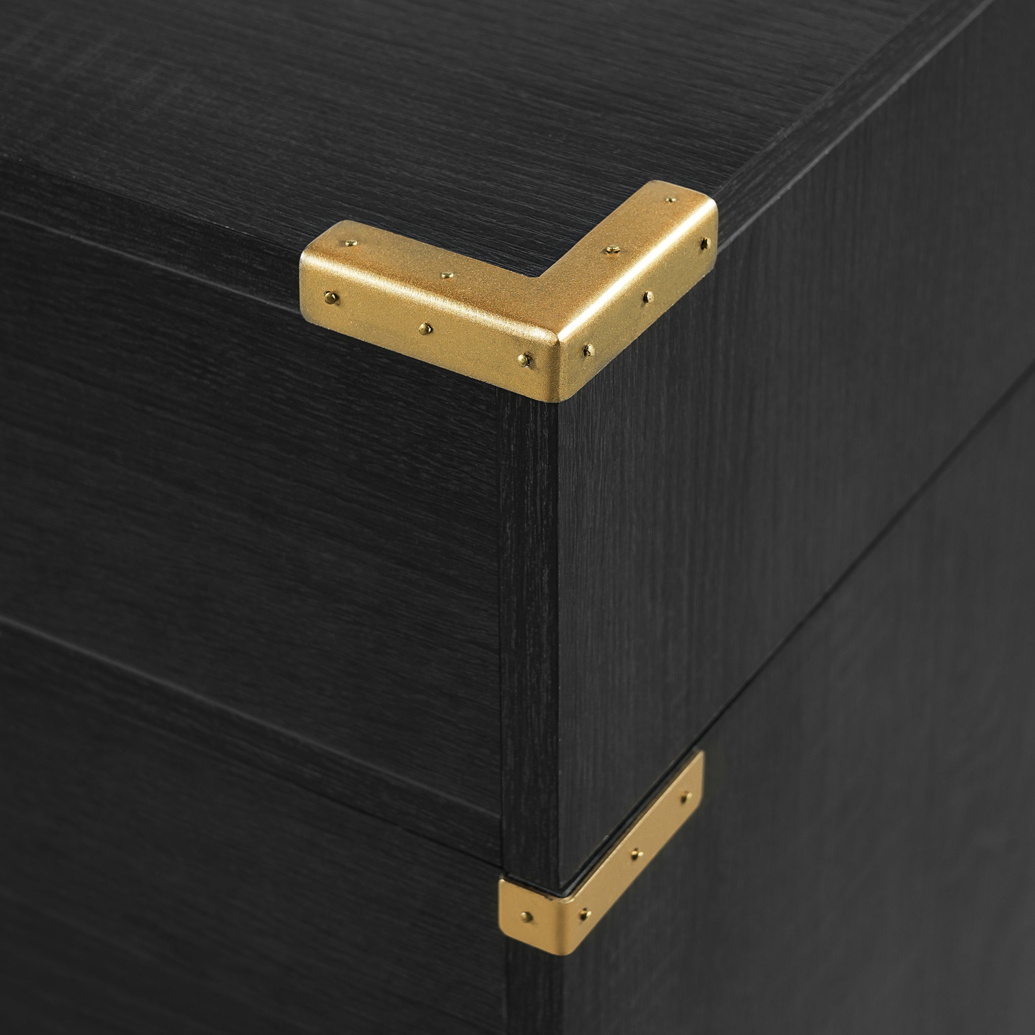 Executive desk with signature metal edge trim from Anthony & Home, showcasing a sleek wooden surface with metal accents.