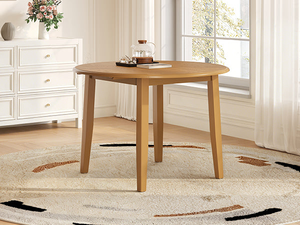 Extendable round dining table by Anthony & Home made of solid wood, featuring a sleek design and adjustable size for versatile dining spaces.