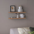 Set of two 31.5-inch walnut finish floating shelves by Anthony & Home, showcasing sleek wall-mounted storage and display space.