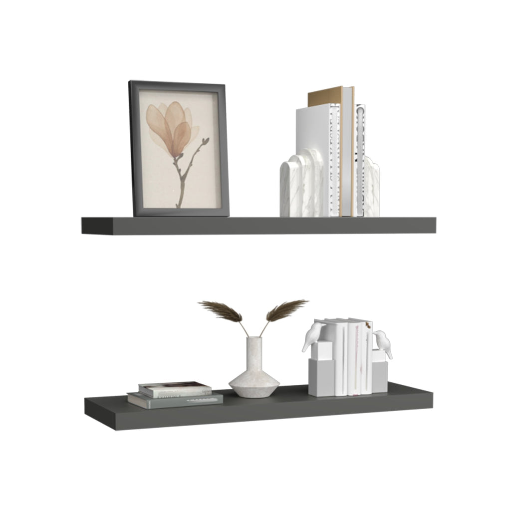 Floating shelves from the Studio Collection by Anthony & Home with a matte gray finish, mounted on a wall for modern storage.