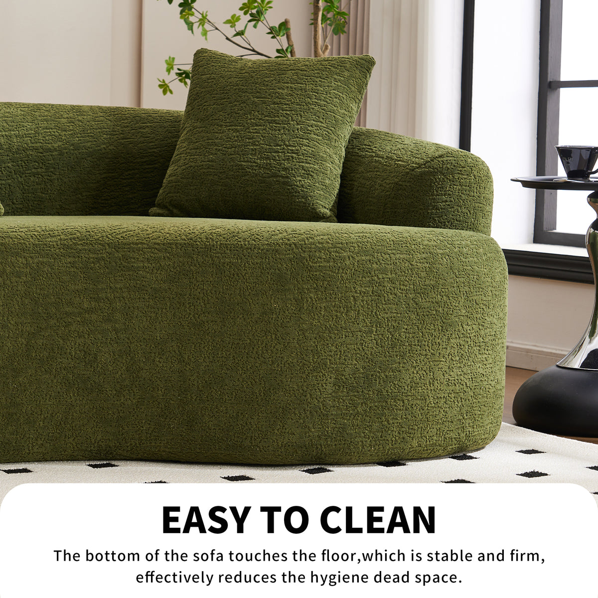 Forest green Atelier curved modular sectional sofa by Anthony & Home, showing plush fabric and modern design in a stylish living room setup.