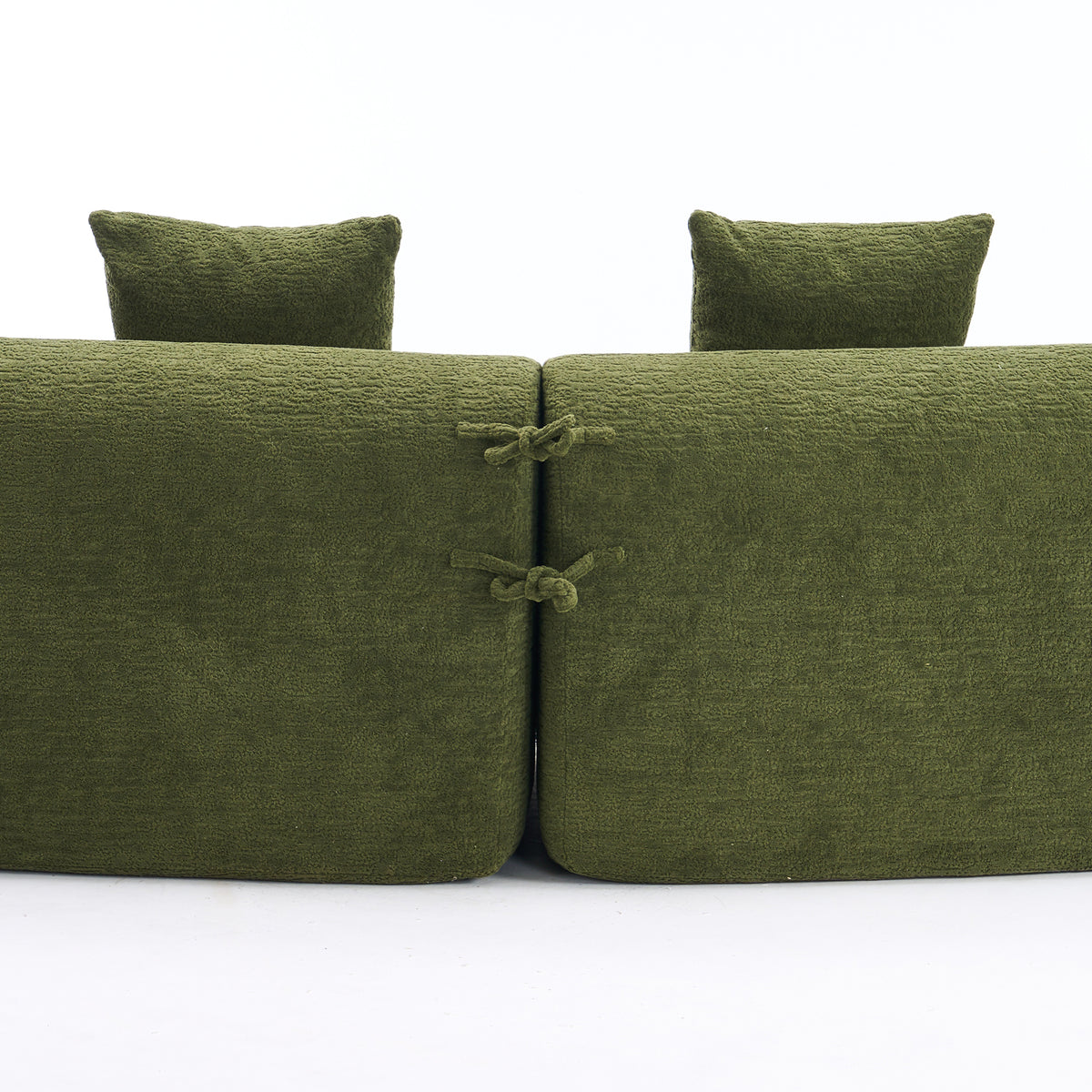 Forest green Atelier curved modular sectional sofa by Anthony & Home, showcasing plush cushions and modern design in a living room setting.