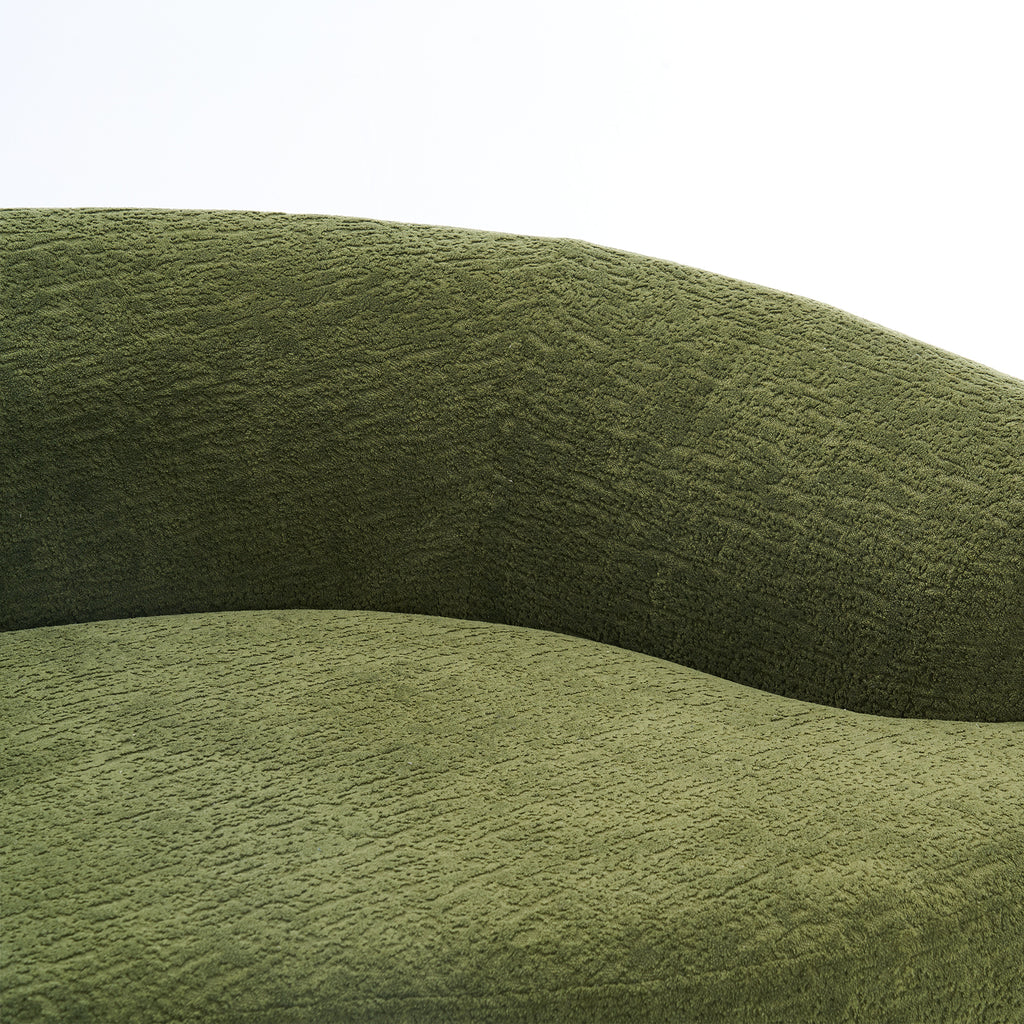 Forest green Anthony & Home Atelier curved sectional sofa with modular design, featuring plush cushions and sleek modern style.