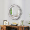Antique white washed wood gear round mirror with a vintage studio style, designed by Anthony & Home.