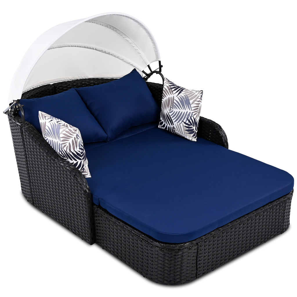 Anthony & Home outdoor double sunbed with adjustable canopy in PE rattan, part of the limited edition collection.