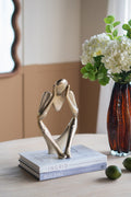 Gold aluminum abstract figurine by Anthony & Home, limited studio edition, showcasing modern sculpture with sleek, artistic design.