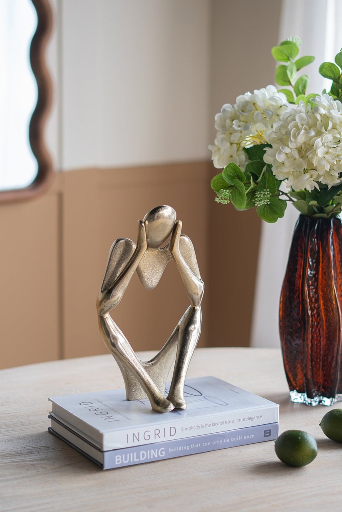 Gold aluminum abstract figurine by Anthony & Home, limited studio edition, showcasing modern sculpture with sleek, artistic design.