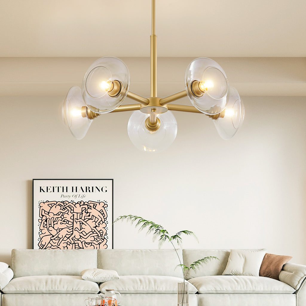 Gold iron Sputnik chandelier with five lights, modern Atelier style by Anthony & Home, featuring a starburst design.