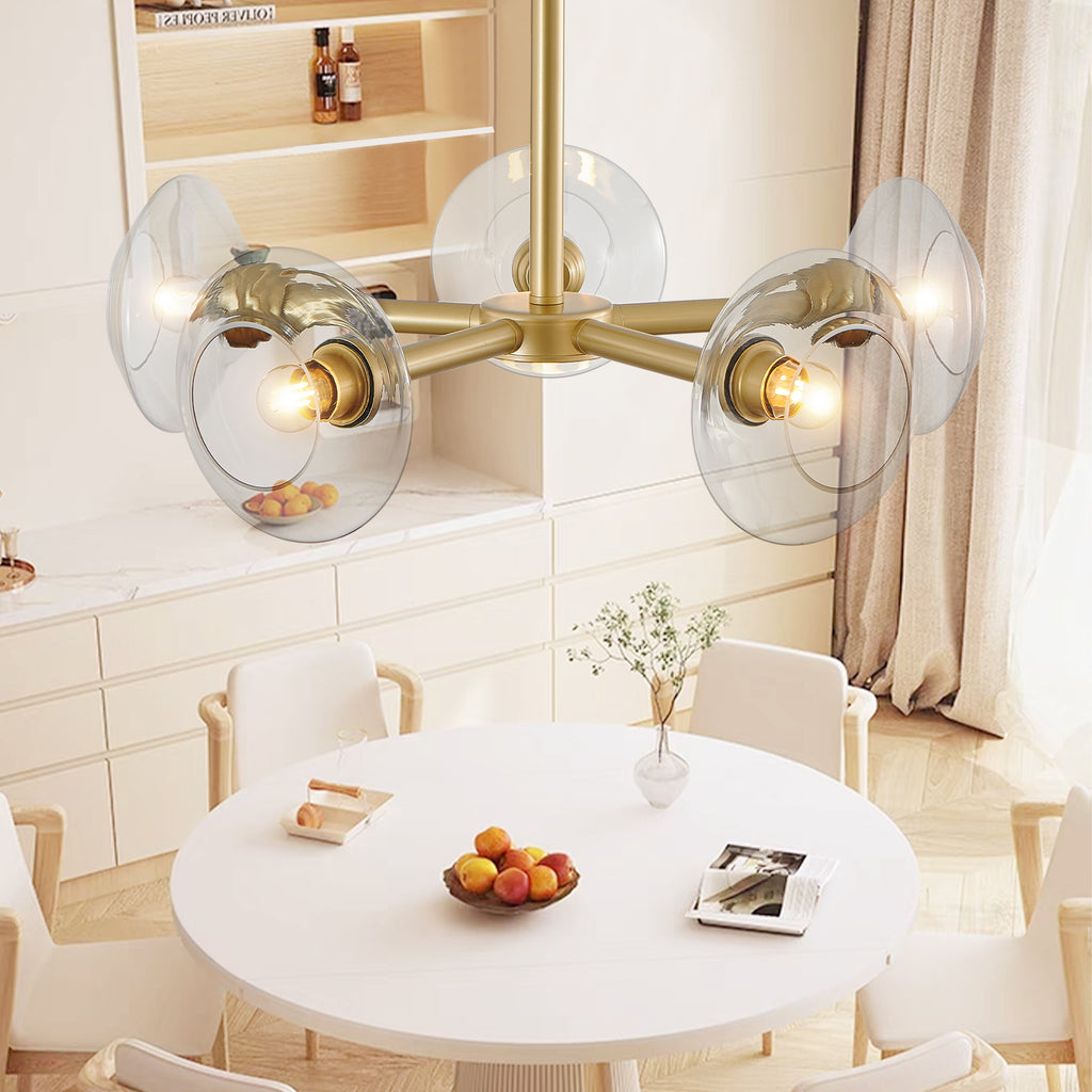 Gold iron Sputnik chandelier with five lights, contemporary atelier design by Anthony & Home, featuring a modern starburst style.