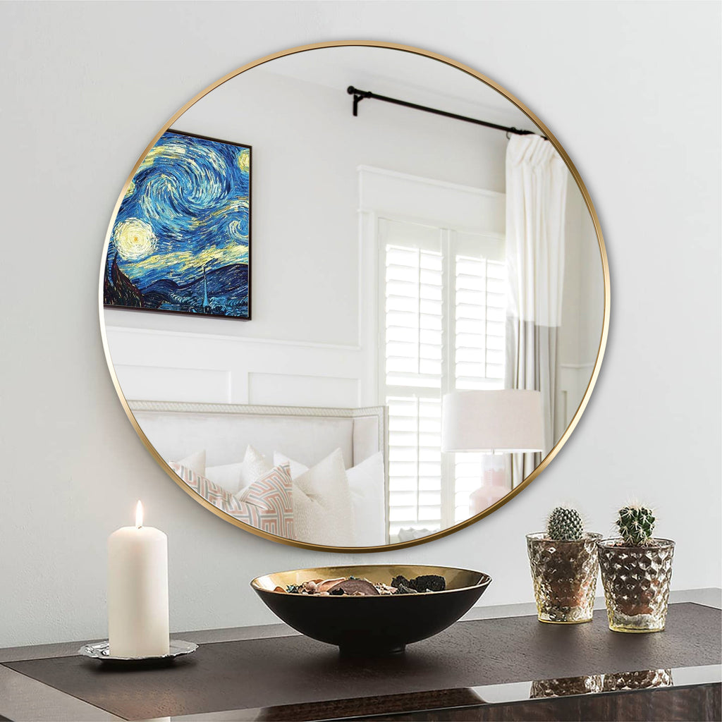 Round 24-inch gold metal bathroom mirror with sleek frame, designed for modern bathroom decor by Anthony & Home.