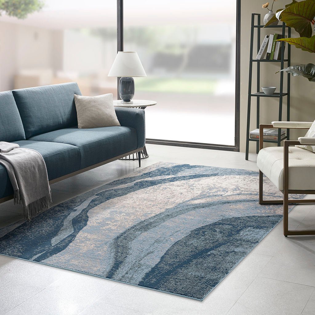 Anthony & Home Grace Abstract Wave area rug with machine-woven polyester cut-and-loop pile in limited edition design.