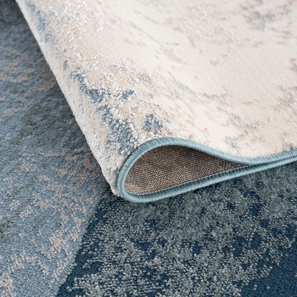 Anthony & Home Grace Abstract Wave Area Rug with machine-woven polyester cut-and-loop pile, limited edition design.