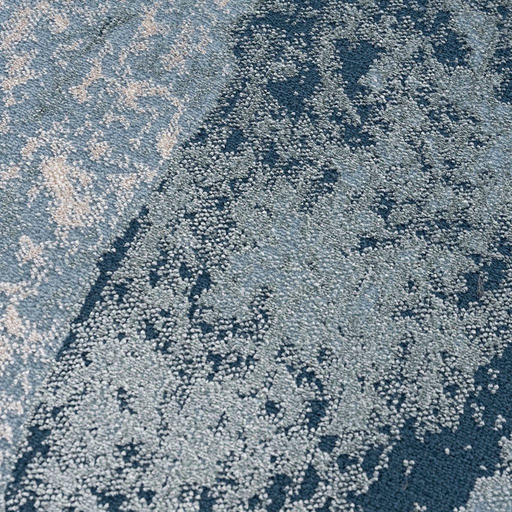 Grace Abstract Wave area rug by Anthony & Home, machine-woven polyester with cut-and-loop pile in a stylish abstract design.