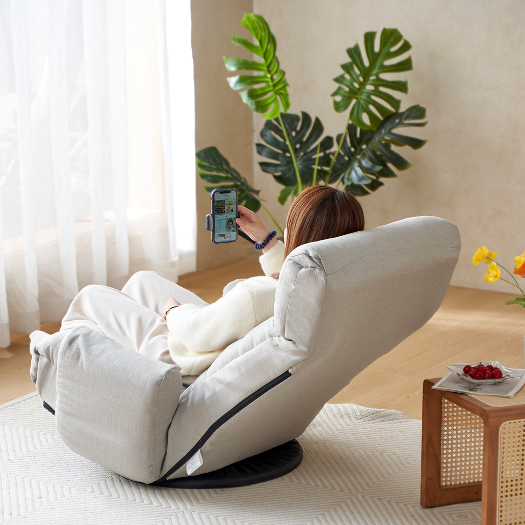 Gray Anthony & Home swivel lounge chair with 360-degree rotation, featuring plush fabric and modern design for comfortable seating.