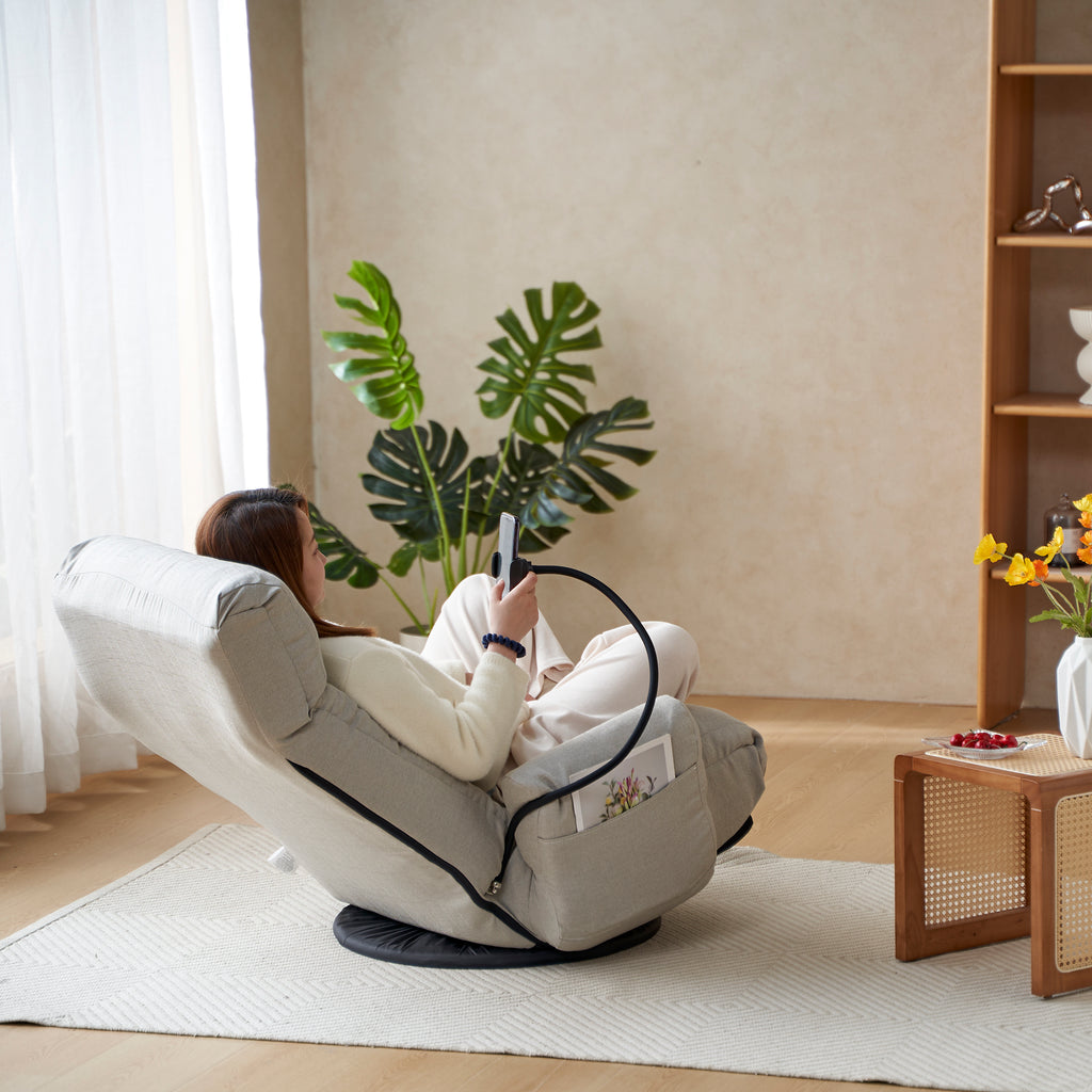 Gray Anthony & Home swivel lounge chair with 360-degree rotation, featuring a modern design and comfortable cushioned seating.