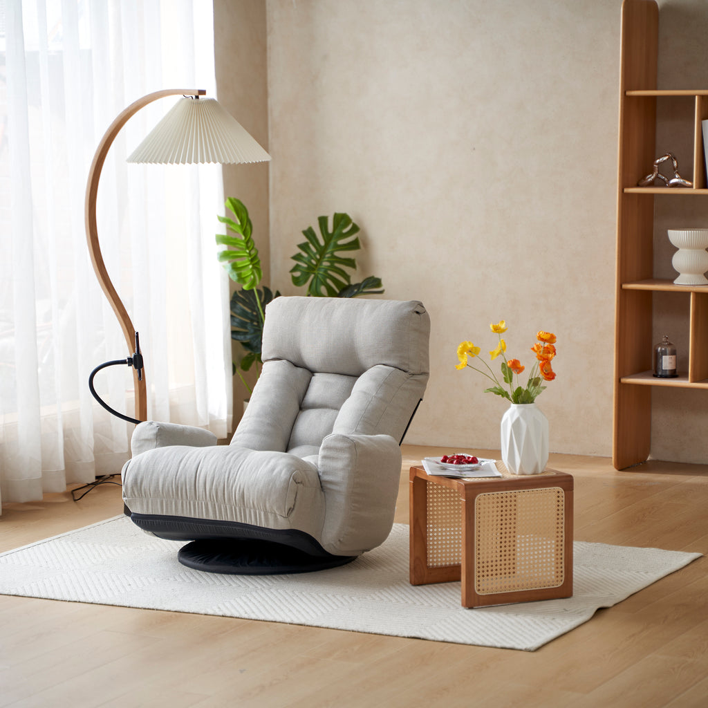 Gray Anthony & Home swivel lounge chair with 360-degree rotation, featuring a modern design and comfortable cushioning.