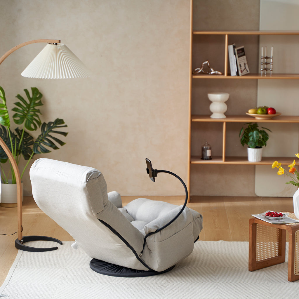 Gray Anthony & Home swivel lounge chair with 360-degree rotation, featuring a modern design and cushioned seat for relaxed comfort.