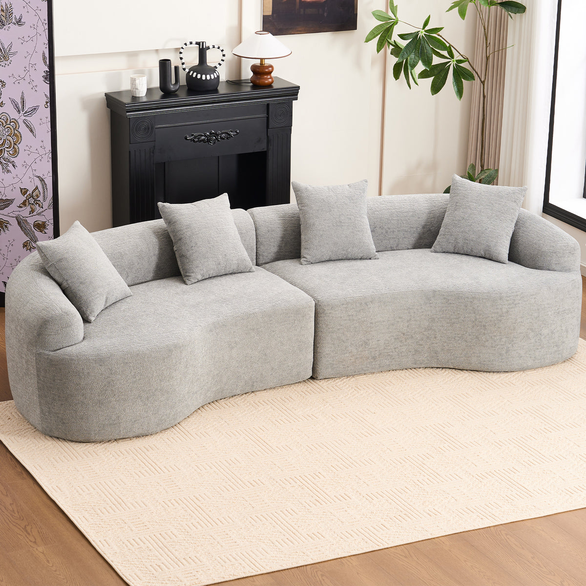 Grey curved modular sofa in chenille fabric, Anthony & Home Exclusive Edition, showcasing its plush, modern design and versatile configuration.