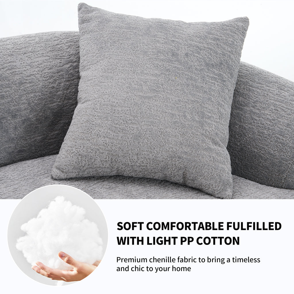 Grey curved modular sofa by Anthony & Home in plush chenille fabric, showcasing its elegant, modern design.
