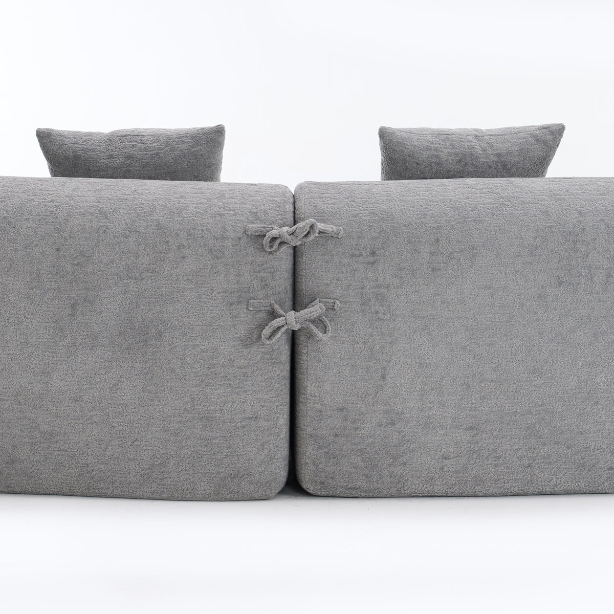 Grey curved modular sofa in chenille fabric from Anthony & Home, showcasing a modern, plush sectional with comfortable cushions.