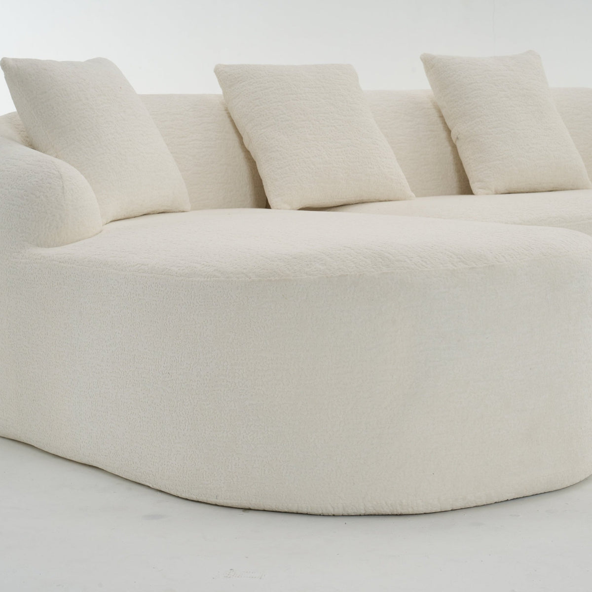 Anthony & Home Heritage Collection L-shaped sectional with curved chaise, elegant minimalist design, modern living room furniture.