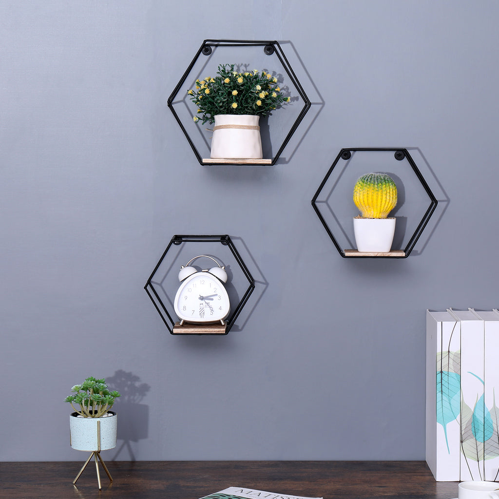 Set of three natural wood hexagonal floating shelves by Anthony & Home, wall-mounted for modern storage and display.