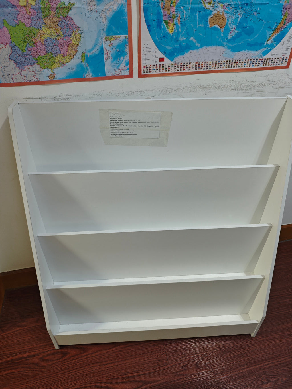 Anthony & Home Kids Bookshelf Exclusive Edition showing a colorful wooden bookshelf filled with children's books and toys.