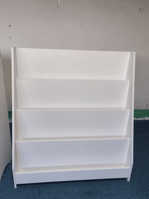 Kids bookshelf from Anthony & Home, exclusive edition with colorful compartments for children's books and toys.