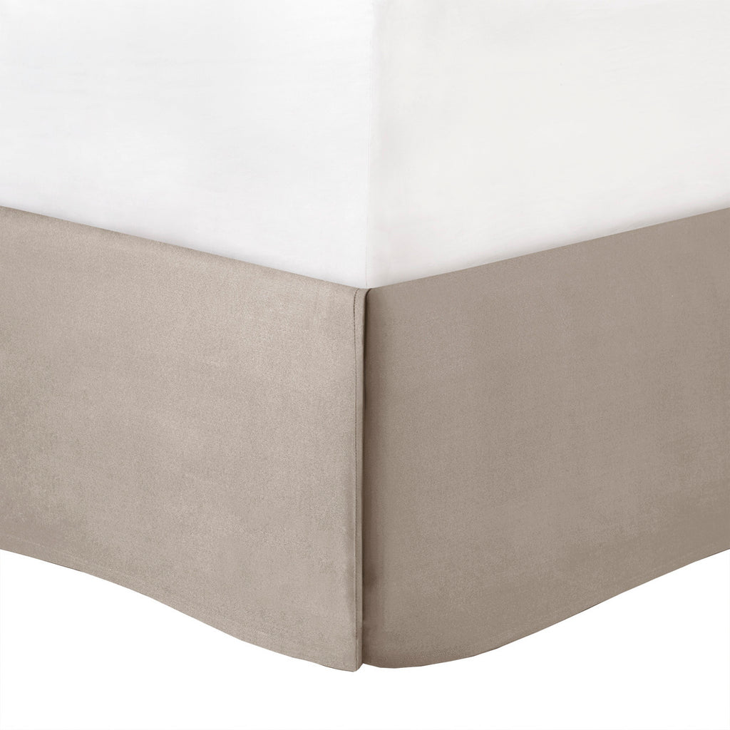 King Laurel tufted comforter set by Anthony & Home with a plush, textured design on a neatly made bed.
